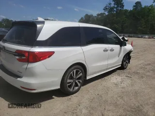 2024 Honda Odyssey Touring with VIN 5FNRL6H84RB014767, listed as a Copart auction lot 57070935 with Not provided miles and Salvage title. Bid and sale history available at DreamBid. Image 3.