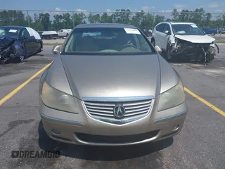 2006 Acura RL z VIN JH4KB16516C000770, wystawiony jako IAAI lot #42440843 z przebiegiem 358 425 mil mil oraz . Historia ofert i sprzedaży dostępna na DreamBid. Obrazek 6.