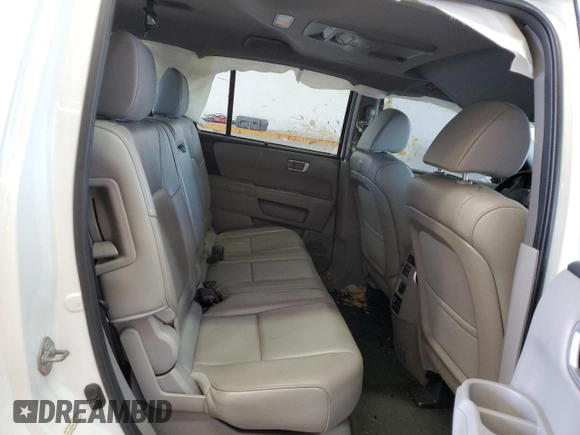 2014 Honda Pilot Touring z VIN 5FNYF4H99EB011079, wystawiony jako Copart lot #57869765 z przebiegiem Nie podano mil oraz Szkoda całkowita • Salvage title. Historia ofert i sprzedaży dostępna na DreamBid. Obrazek 11.