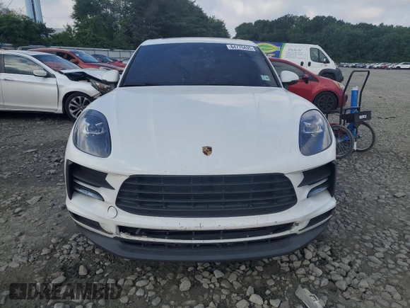 2021 Porsche Macan with VIN WP1AA2A5XMLB01007, listed as a Copart auction lot 64775435 with 83,924 mi miles and Salvage title. Bid and sale history available at DreamBid. Image 5.