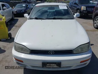1993 Toyota Camry LE z VIN JT2SK12E0P0143650, wystawiony jako IAAI lot #42345181 z przebiegiem 264 350 mil mil oraz . Historia ofert i sprzedaży dostępna na DreamBid. Obrazek 6.