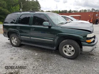 2001 Chevrolet Tahoe LT with VIN 1GNEK13T21J168737, listed as a Copart auction lot 56449655 with 133,688 mi miles and Salvage title. Bid and sale history available at DreamBid. Image 4.