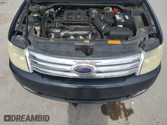 2008 Ford Taurus Limited with VIN 1FAHP25W78G128851, listed as a Copart auction lot 61254015 with 216,335 mi miles and Salvage title. Bid and sale history available at DreamBid. Image 11.