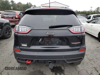 2022 Jeep Cherokee Trailhawk with VIN 1C4PJMBX3ND502322, listed as a Copart auction lot 85561444 with 57,630 mi miles and Salvage Title. Bid and sale history available at carsss.com. Image 6.