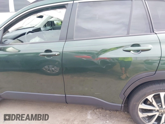 2023 Toyota Corolla Cross XLE with VIN 7MUEAAAG9PV053569, listed as a IAAI auction lot 42319709 with 71,105 mi miles and . Bid and sale history available at DreamBid. Image 13.