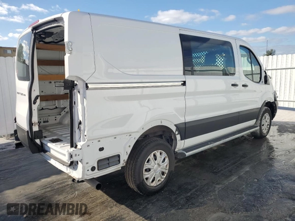 2024 Ford Transit Cargo with VIN 1FTBR1Y85RKA33351, listed as a Copart auction lot 84259294 with 4,169 mi miles and Clean Title. Bid and sale history available at DreamBid. Image 3.