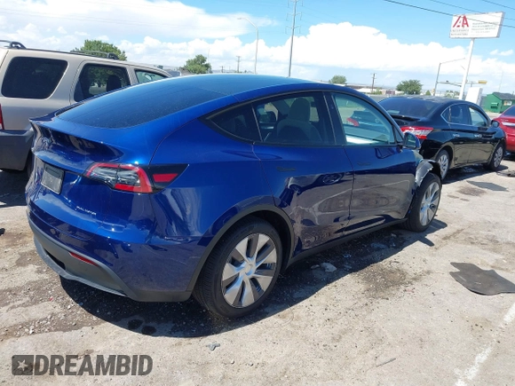 2024 Tesla Model Y Long Range with VIN 7SAYGDEE6RA242980, listed as a IAAI auction lot 40121685 with 9,126 mi miles and . Bid and sale history available at DreamBid. Image 4.