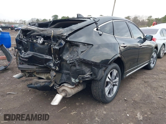 2014 Honda Crosstour EX-L z VIN 5J6TF2H57EL004084, wystawiony jako IAAI lot #42020402 z przebiegiem 116 356 mil mil oraz . Historia ofert i sprzedaży dostępna na DreamBid. Obrazek 4.