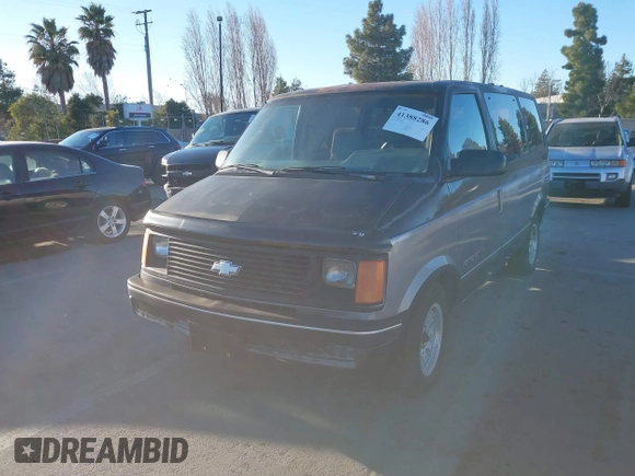 1991 Chevrolet Astro with VIN 1GNDM19Z2MB123653, listed as a IAAI auction lot 41388286 with 175,009 mi miles. Bid and sale history available at carsss.com. Image 2.