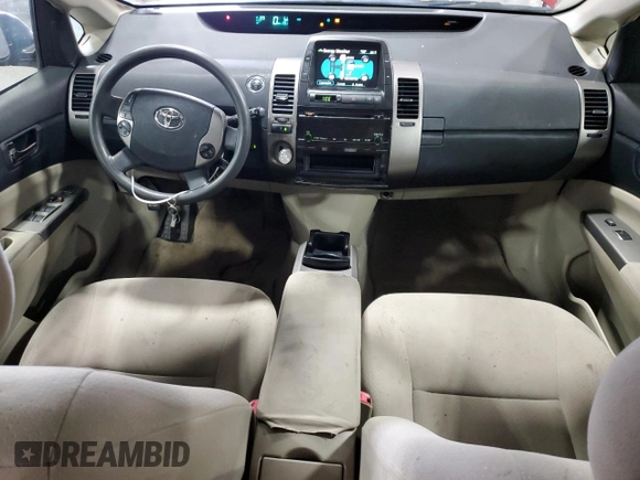 2007 Toyota Prius z VIN JTDKB20UX73291536, wystawiony jako Copart lot #61506475 z przebiegiem 256 114 mil mil oraz Czysty tytuł • Clean title. Historia ofert i sprzedaży dostępna na DreamBid. Obrazek 8.