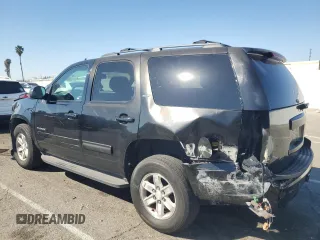 2014 GMC Yukon SLT with VIN 1GKS1CE07ER208318, listed as a Copart auction lot 46097405 with 98,882 mi miles and Salvage Title. Bid and sale history available at carsss.com. Image 2.