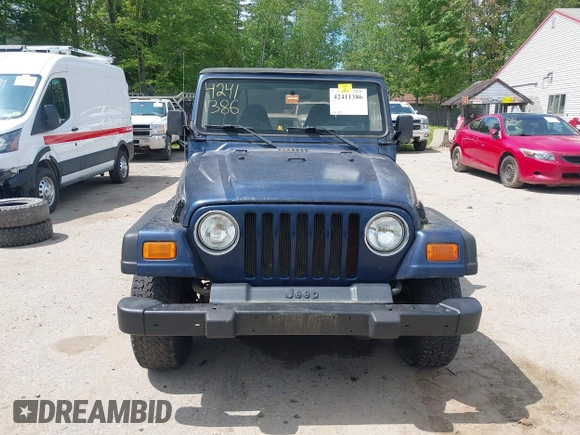 2002 Jeep Wrangler X with VIN 1J4FA39S82P735794, listed as a IAAI auction lot 42411386 with 141,219 mi miles and . Bid and sale history available at DreamBid. Image 13.