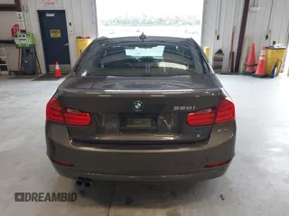 2015 BMW 3 Series 328i with VIN WBA3A5C57FF609734, listed as a IAAI auction lot 41392336 with 121,378 mi miles. Bid and sale history available at carsss.com. Image 16.