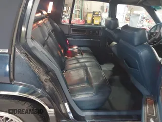 1989 Cadillac DeVille z VIN 1G6CD5159K4356924, wystawiony jako IAAI lot #41526057 z przebiegiem 148 134 mil mil oraz . Historia ofert i sprzedaży dostępna na DreamBid. Obrazek 8.
