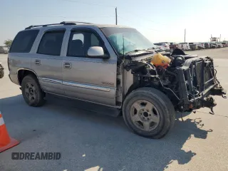 2004 GMC Yukon SLE z VIN 1GKEC13V64R277493, wystawiony jako Copart lot #68819754 z przebiegiem 125 731 mil mil oraz Szkoda całkowita • Salvage title. Historia ofert i sprzedaży dostępna na DreamBid. Obrazek 4.