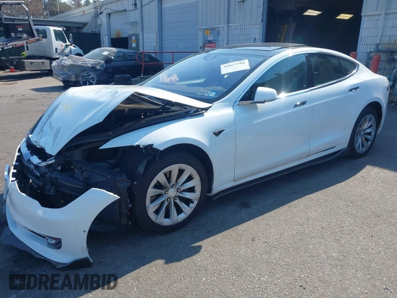2016 Tesla Model S 90D with VIN 5YJSA1E26GF147327, listed as a IAAI auction lot 42077766 with 89,502 mi miles and . Bid and sale history available at DreamBid. Image 20.