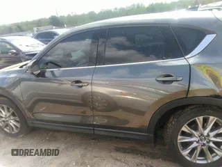 2019 Mazda CX-5 Grand Touring with VIN JM3KFBDM7K0606860, listed as a IAAI auction lot 41936338 with 93,057 mi miles. Bid and sale history available at carsss.com. Image 14.