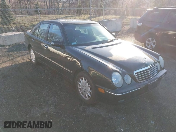2000 Mercedes-Benz E-Class with VIN WDBJF65J1YB058351, listed as a IAAI auction lot 41834603 with 100,525 mi miles. Bid and sale history available at carsss.com. Image 1.