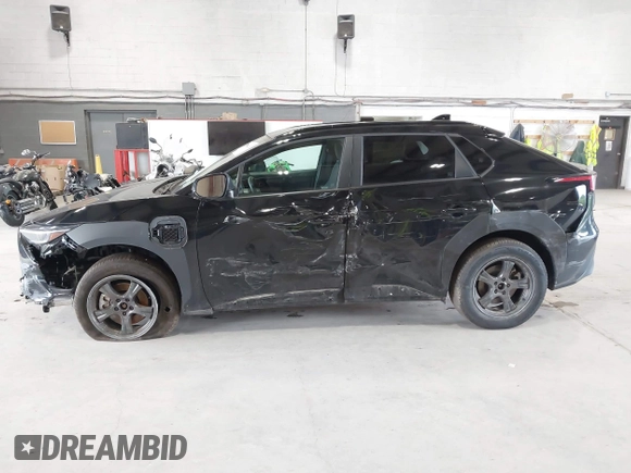 2024 Subaru Solterra Touring with VIN JTMABABA9RA052065, listed as a IAAI auction lot 42648692 with 13,880 mi miles and . Bid and sale history available at DreamBid. Image 6.