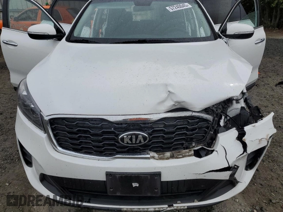 2020 Kia Sorento LX z VIN 5XYPG4A36LG698588, wystawiony jako Copart lot #57240045 z przebiegiem 75 298 mil mil oraz Szkoda całkowita • Salvage title. Historia ofert i sprzedaży dostępna na DreamBid. Obrazek 12.