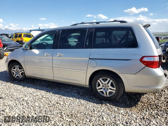 2007 Honda Odyssey EX-L z VIN 5FNRL38647B028078, wystawiony jako Copart lot #56208005 z przebiegiem 192 000 mil mil oraz Szkoda całkowita • Salvage title. Historia ofert i sprzedaży dostępna na DreamBid. Obrazek 2.