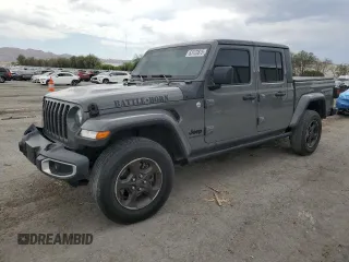 2021 Jeep Gladiator Willys z VIN 1C6HJTAG3ML505667, wystawiony jako Copart lot #63123875 z przebiegiem 57 388 mil mil oraz Szkoda całkowita • Salvage title. Historia ofert i sprzedaży dostępna na DreamBid. Obrazek 1.