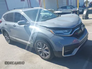 2020 Honda CR-V Touring z VIN 7FART6H98LE013948, wystawiony jako IAAI lot #42228930 z przebiegiem 63 650 mil mil oraz . Historia ofert i sprzedaży dostępna na DreamBid. Obrazek 1.
