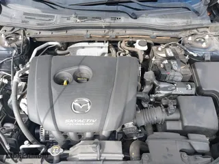 2016 Mazda Mazda3 i Grand Touring with VIN JM1BM1N74G1319656, listed as a IAAI auction lot 41561603 with 123,610 mi miles. Bid and sale history available at carsss.com. Image 10.