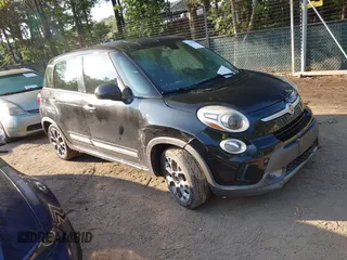 2014 FIAT 500L Trekking with VIN ZFBCFADH5EZ010661, listed as a IAAI auction lot 42861787 with 230,404 mi miles and . Bid and sale history available at DreamBid. Image 1.