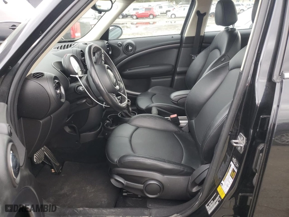 2015 MINI Cooper Countryman S with VIN WMWZC3C5XFWT02471, listed as a Copart auction lot 43716635 with 77,929 mi miles and Salvage Title. Bid and sale history available at carsss.com. Image 7.