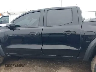2023 Chevrolet Colorado 4WD Trail Boss with VIN 1GCPTEEK6P1253972, listed as a IAAI auction lot 41864105 with 19,238 mi miles. Bid and sale history available at carsss.com. Image 14.