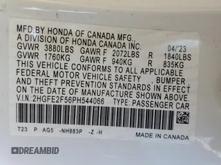 2023 Honda Civic Sedan Sport with VIN 2HGFE2F56PH544066, listed as a Copart auction lot 43642265 with 21,719 mi miles and Salvage Title. Bid and sale history available at carsss.com. Image 12.