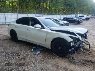 2017 Infiniti Q50 Premium with VIN JN1EV7AR2HM830404, listed as a Copart auction lot 57874785 with 104,369 mi miles and Salvage title. Bid and sale history available at DreamBid. Image 4.