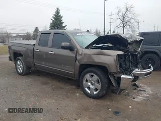 2015 Chevrolet Silverado 1500 LT with VIN 1GCVKREC9FZ237338, listed as a IAAI auction lot 41897225 with 154,229 mi miles and . Bid and sale history available at DreamBid. Image 1.