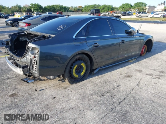 2015 Audi S8 z VIN WAUK2AFD5FN021986, wystawiony jako IAAI lot #41986491 z przebiegiem 142 073 mil mil oraz . Historia ofert i sprzedaży dostępna na DreamBid. Obrazek 4.