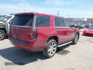 2015 Cadillac Escalade Luxury z VIN 1GYS3BKJ3FR275149, wystawiony jako IAAI lot #42052367 z przebiegiem 111 133 mil mil oraz . Historia ofert i sprzedaży dostępna na DreamBid. Obrazek 4.