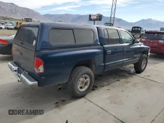 2002 Dodge Dakota SLT with VIN 1B7HG48N32S720700, listed as a Copart auction lot 80234494 with 207,035 mi miles and Salvage Title. Bid and sale history available at carsss.com. Image 3.