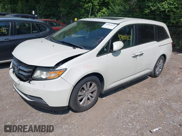 2014 Honda Odyssey EX-L with VIN 5FNRL5H63EB131596, listed as a IAAI auction lot 42402427 with 106,156 mi miles and . Bid and sale history available at DreamBid. Image 2.