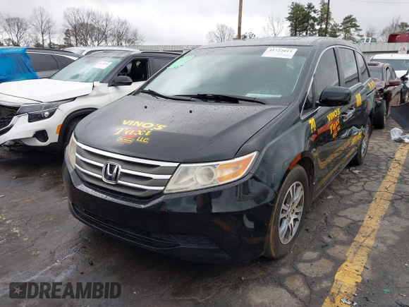 2012 Honda Odyssey EX-L with VIN 5FNRL5H64CB142247, listed as a IAAI auction lot 41722015 with 179,637 mi miles and . Bid and sale history available at carsss.com. Image 2.