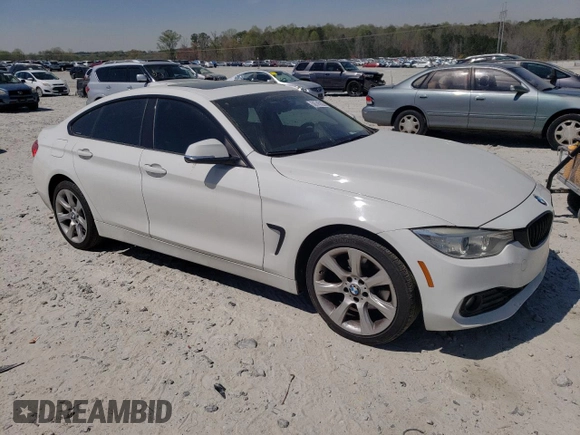 2015 BMW 4 Series 428i xDrive with VIN WBA4A7C50FD415218, listed as a Copart auction lot 50745555 with 139,343 mi miles and Salvage title. Bid and sale history available at DreamBid. Image 4.