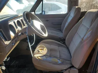 1988 Ford Bronco with VIN 1FMCU14T9JUB53901, listed as a Copart auction lot 84953454 with 222,374 mi miles and Clean title. Bid and sale history available at DreamBid. Image 7.