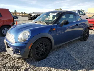 2012 MINI Cooper Coupe with VIN WMWSX1C5XCT163773, listed as a Copart auction lot 85792764 with 70,411 mi miles and Salvage Title. Bid and sale history available at carsss.com. Image 1.