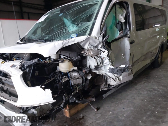 2018 Ford Transit Passenger XL with VIN 1FBZX2YM0JKA87639, listed as a IAAI auction lot 38957868 with Not provided miles and . Bid and sale history available at DreamBid. Image 6.
