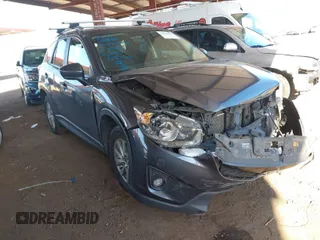 2014 Mazda CX-5 Touring with VIN JM3KE4CY1E0402062, listed as a IAAI auction lot 41906961 with 192,439 mi miles. Bid and sale history available at carsss.com. Image 1.