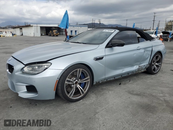 2014 BMW M6 z VIN WBSLZ9C50EDZ78344, wystawiony jako Copart lot #54719265 z przebiegiem 59 556 mil mil oraz Szkoda całkowita • Salvage title. Historia ofert i sprzedaży dostępna na DreamBid. Obrazek 1.