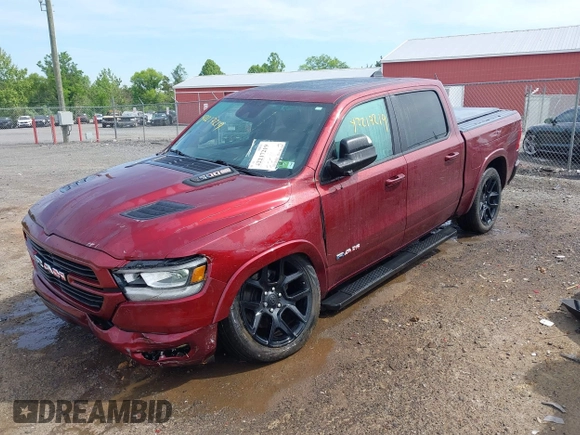 2022 Ram 1500 Laramie z VIN 1C6SRFJT0NN333200, wystawiony jako IAAI lot #42217219 z przebiegiem 27 332 mil mil oraz . Historia ofert i sprzedaży dostępna na DreamBid. Obrazek 2.