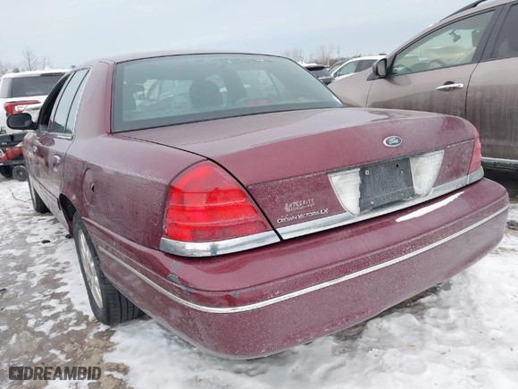 2004 Ford Crown Victoria LX with VIN 2FAFP74W14X128791, listed as a IAAI auction lot 41405101 with 137,091 mi miles. Bid and sale history available at carsss.com. Image 3.