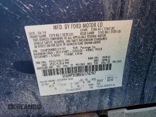 2014 Ford Taurus SEL z VIN 1FAHP2E88EG174797, wystawiony jako Copart lot #53961615 z przebiegiem Nie podano mil oraz Szkody całkowita. Historia ofert i sprzedaży dostępna na DreamBid. Obrazek 12.
