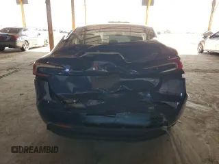 2025 Tesla Model 3 Long Range with VIN 5YJ3E1EA7SF880270, listed as a Copart auction lot 49733925 with 7,542 mi miles and Salvage Title. Bid and sale history available at DreamBid. Image 6.