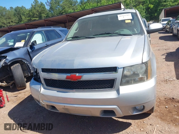 2014 Chevrolet Tahoe LT with VIN 1GNSCBE00ER147899, listed as a IAAI auction lot 42322761 with 299,342 mi miles and . Bid and sale history available at DreamBid. Image 12.